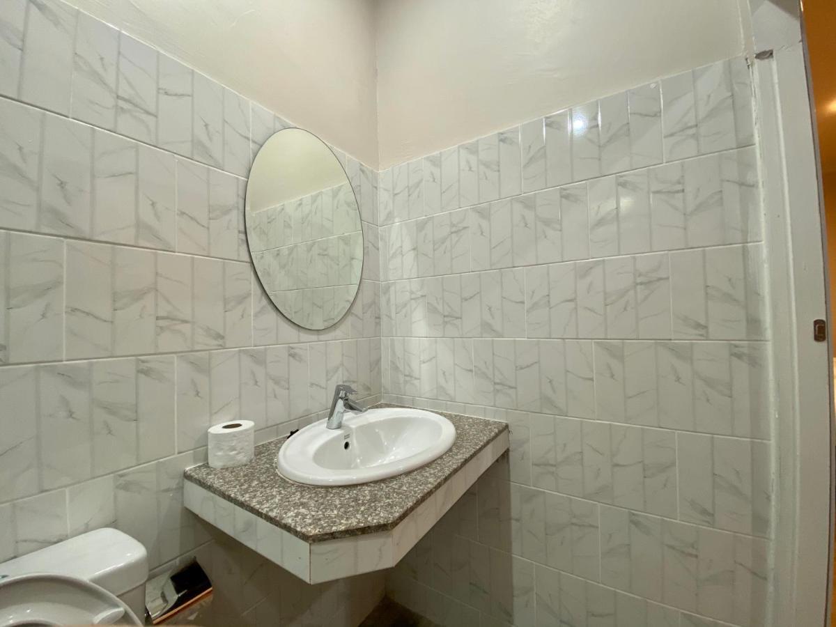 Funwan Hotel Li Bagian luar foto