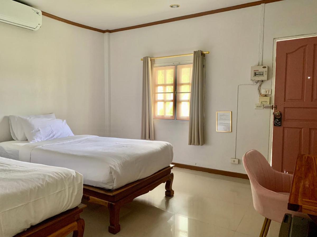 Funwan Hotel Li Bagian luar foto