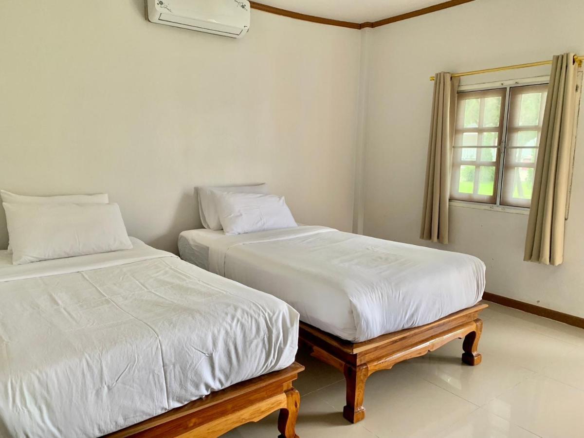 Funwan Hotel Li Bagian luar foto